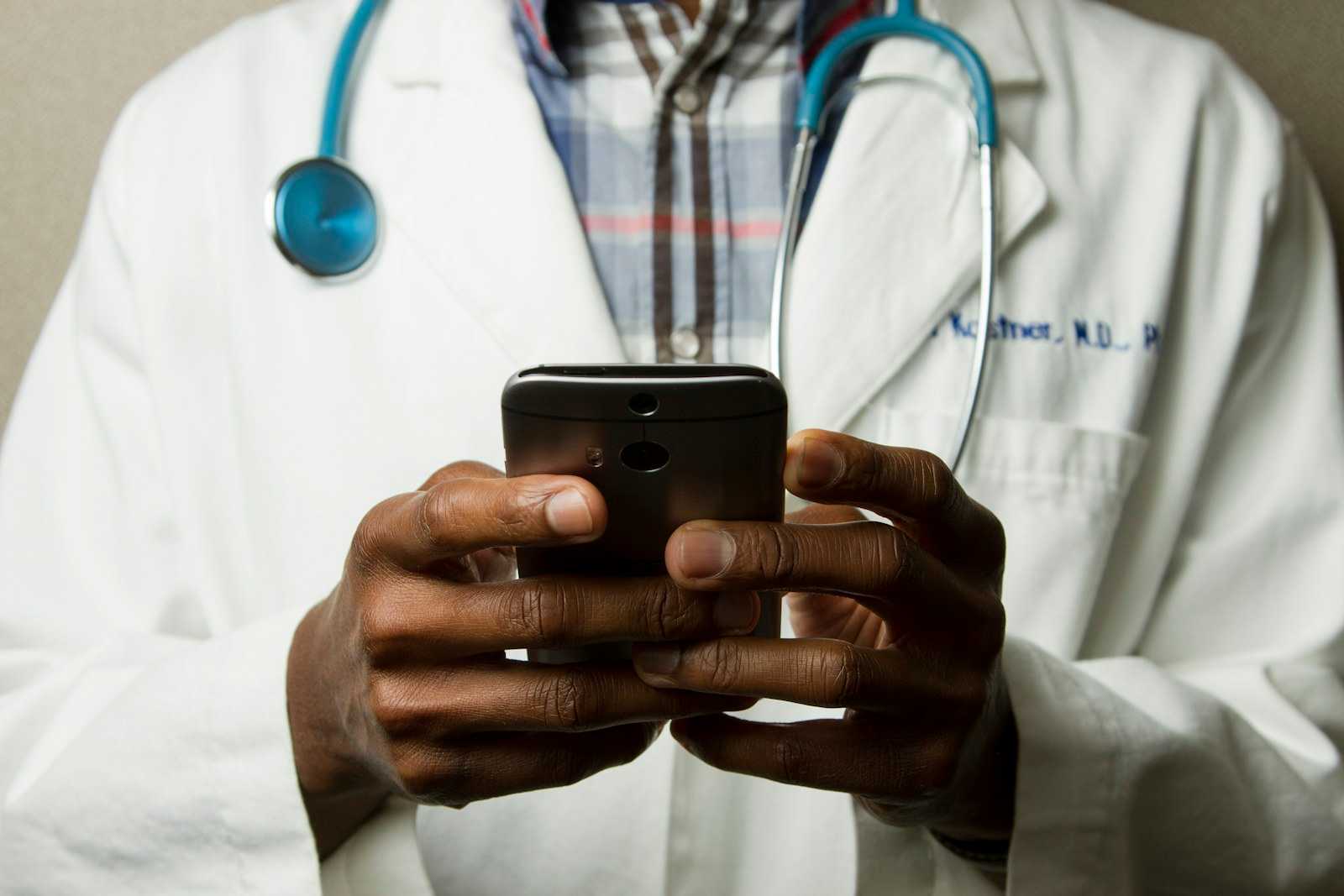 Healthcare professional holding medical equipment